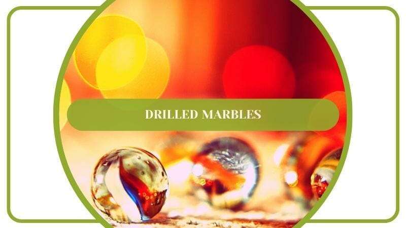 Hide Unsightly Fence With Drilled Marbles